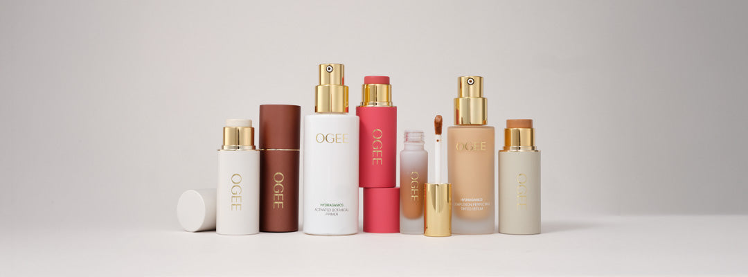 “A lineup of seven Ogee organic beauty and skincare products arranged horizontally against a clean, light gray background.”